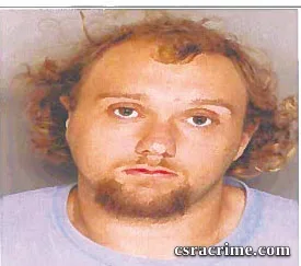 Troy Barnes booking photo