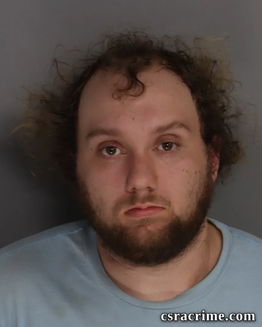 Troy Barnes booking photo