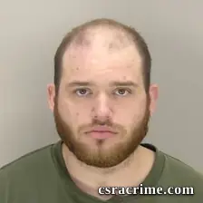 Tyler Greene booking photo