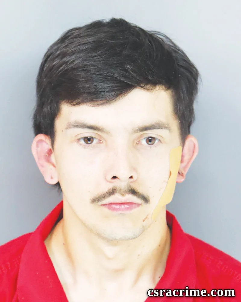 Zachary Melo booking photo