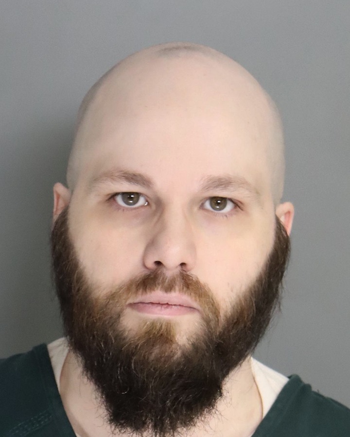 Booking photo of Johnny Dehart